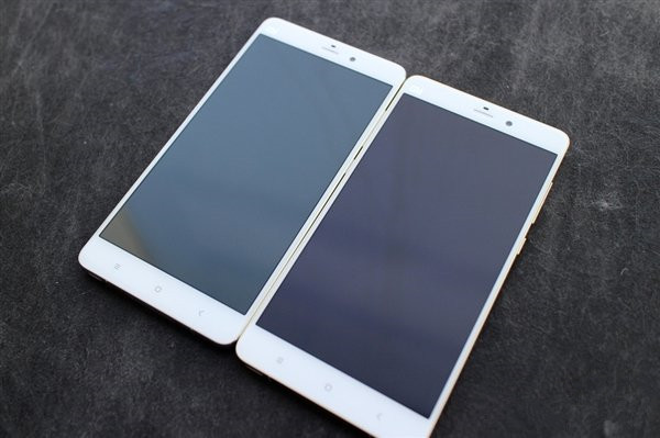 小米Note顶配开箱图赏:土豪金边框大亮